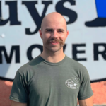 Mover Cody in front of a moving truck