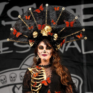 Woman dressed in Dia de los Muertos regalia